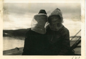 Image: Donald and Miriam MacMillan on Thebaud with head nets